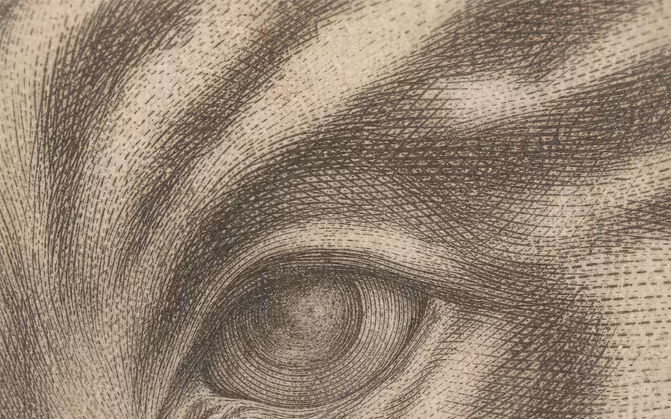 Faded engraved tiger-eye fragment on aged paper, cropped close to feel inert and unfinished.